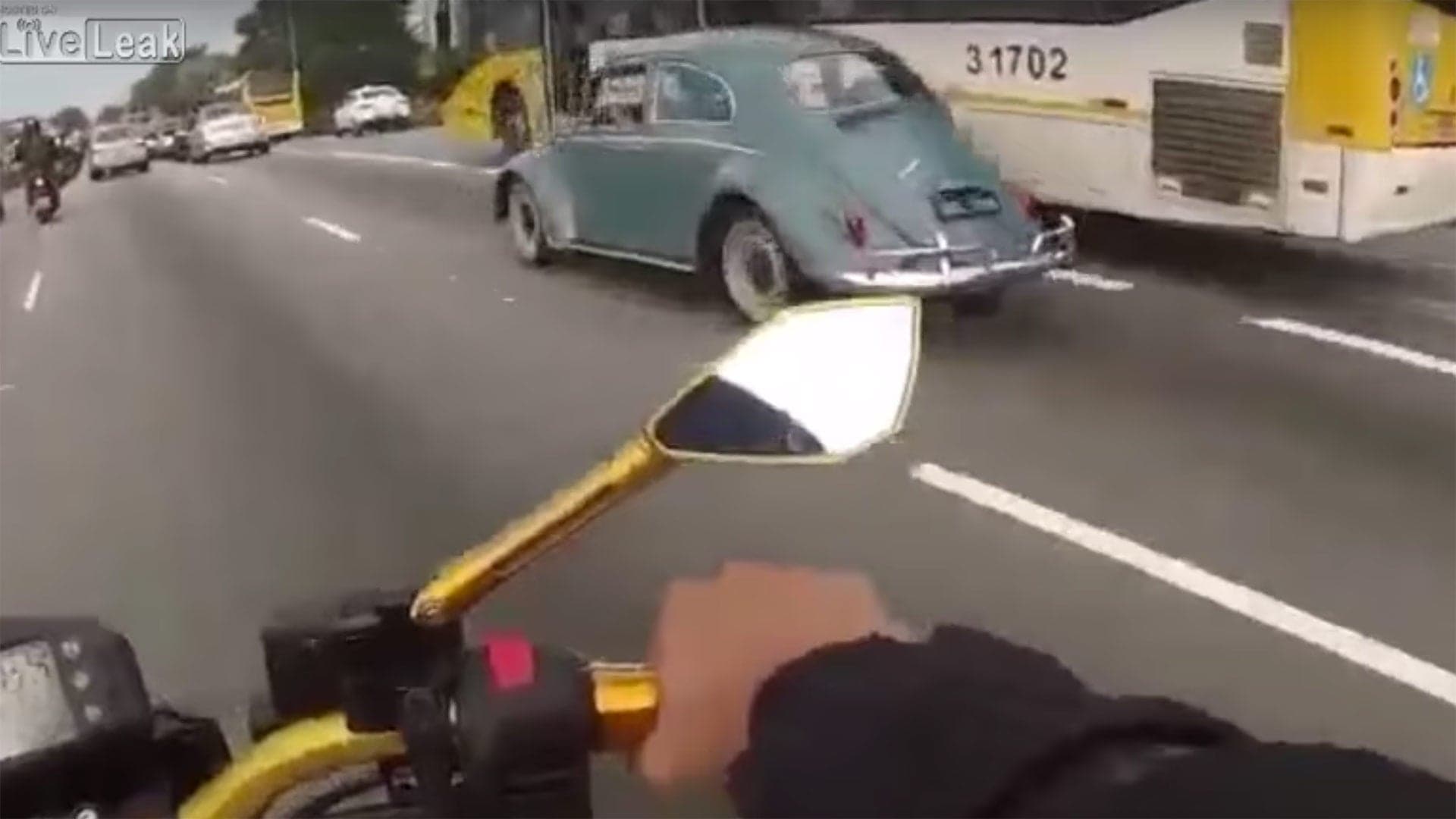 Motorcyclist Plows Into Car After Staring at Volkswagen Beetle