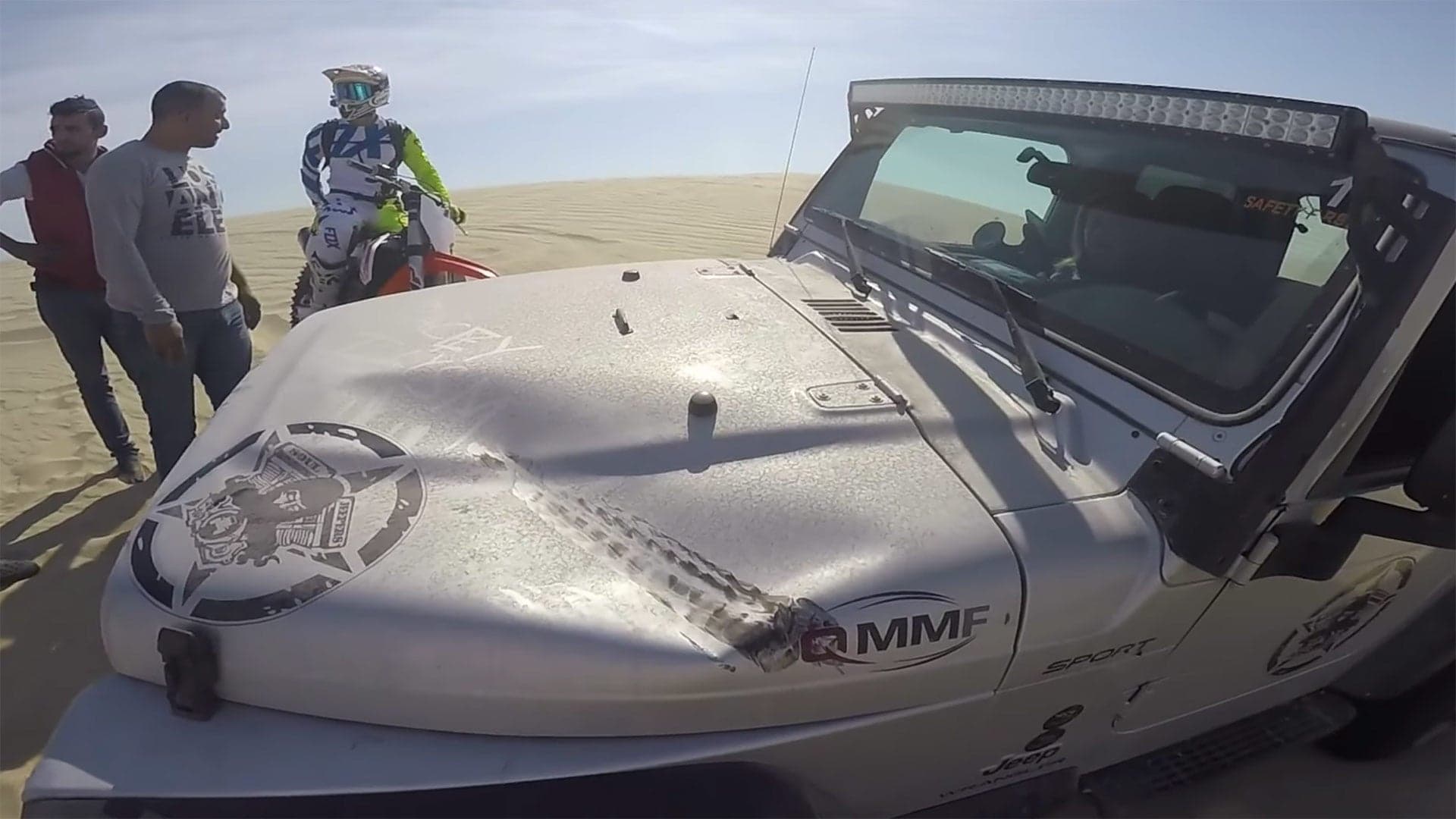 Watch This Dirt Bike Land On the Hood Of a Jeep Wrangler