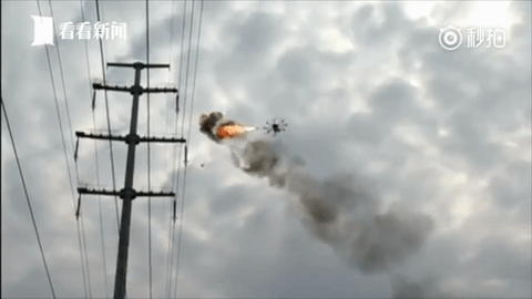 Watch China’s Flying Flame Thrower Drone Burn Trash Off Power Lines