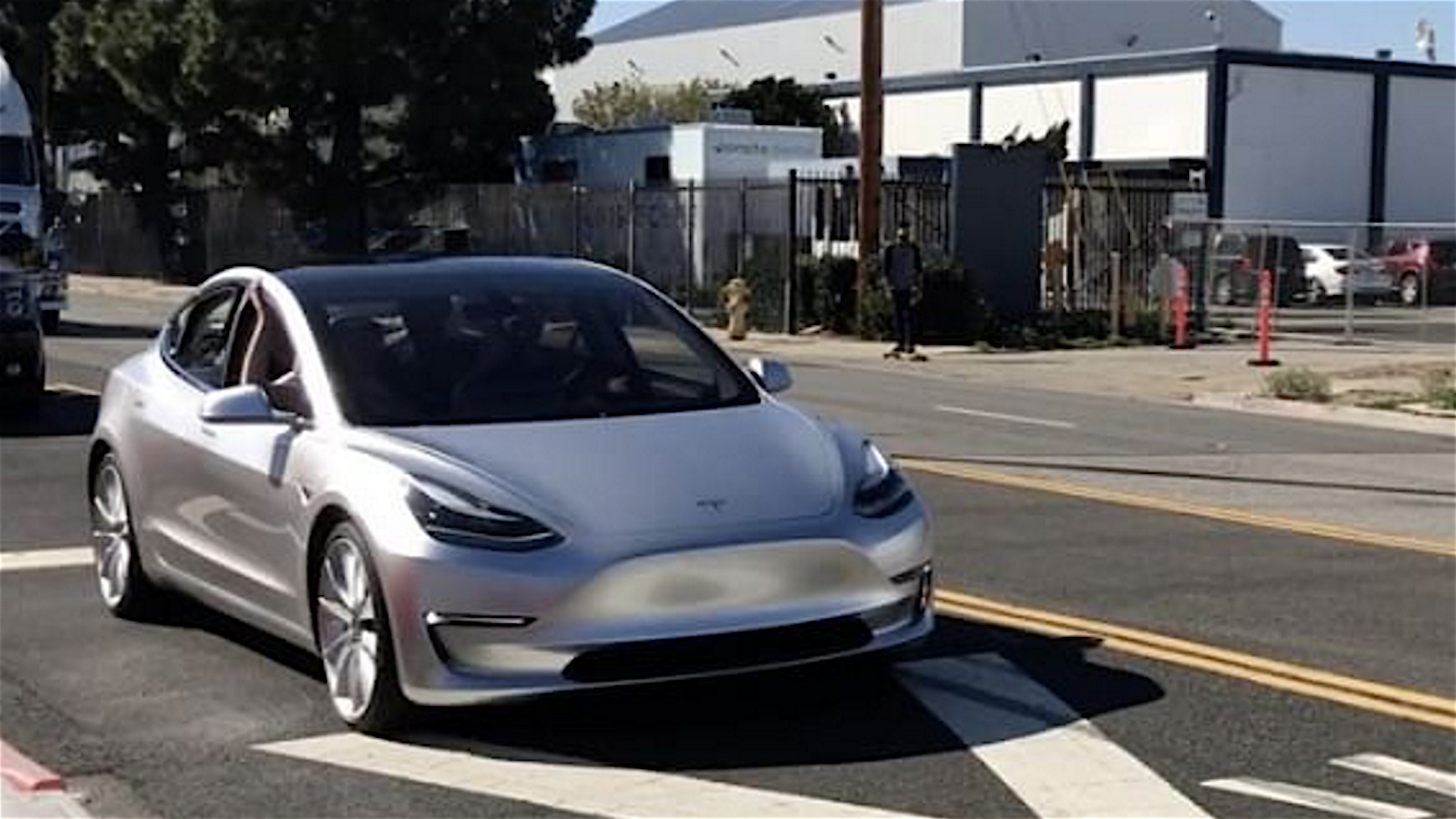 Watch a Tesla Model 3 Roll Down a Street Near SpaceX HQ