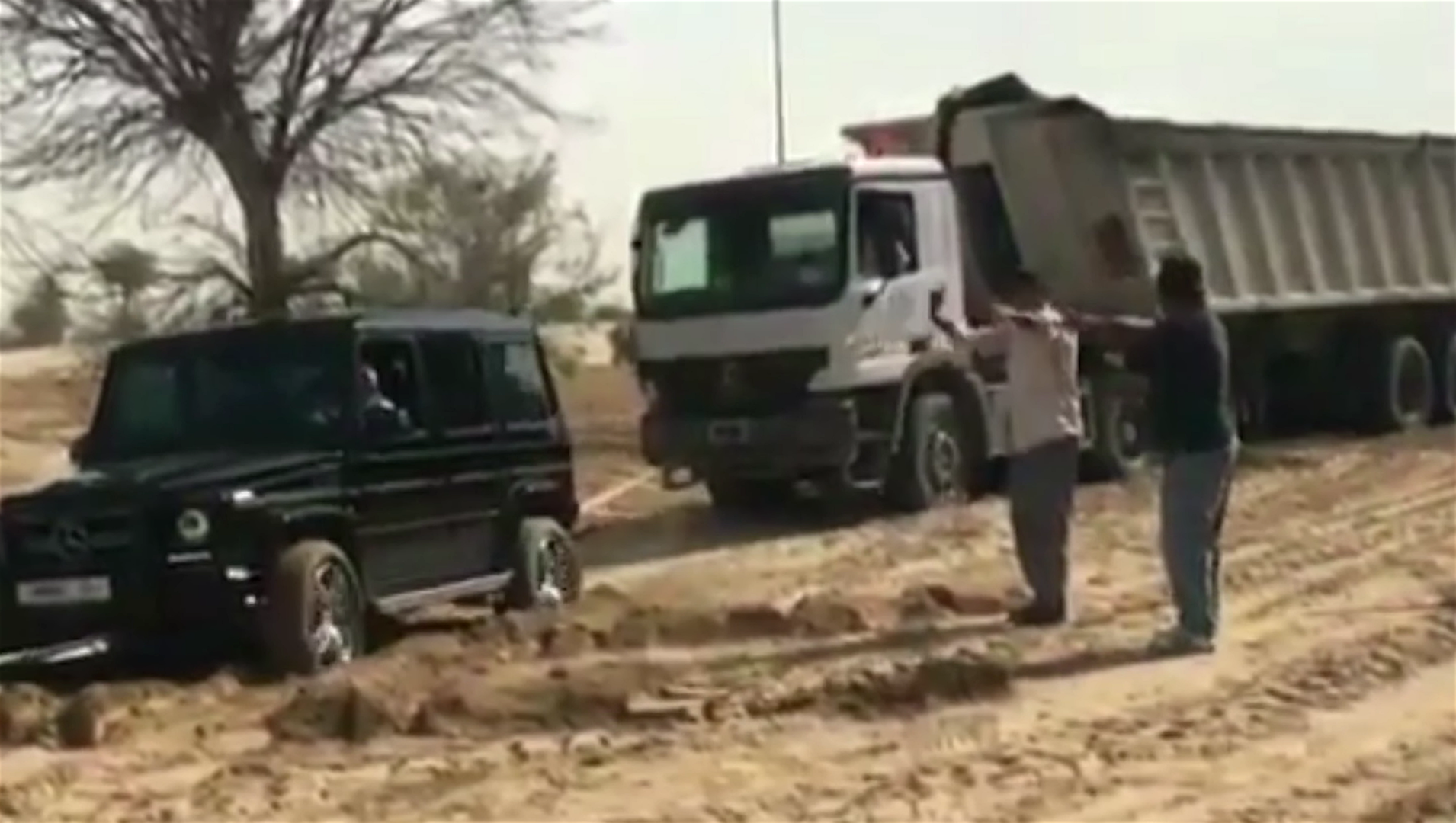 Watch a Dubai Prince Use a Mercedes-Benz G-Wagen to Tow a Truck From the Sand