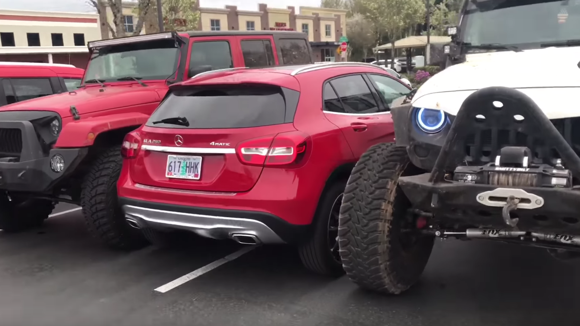 Watch Two Jeeps Trap a Mercedes-Benz After Its Driver Parks Like a Fool