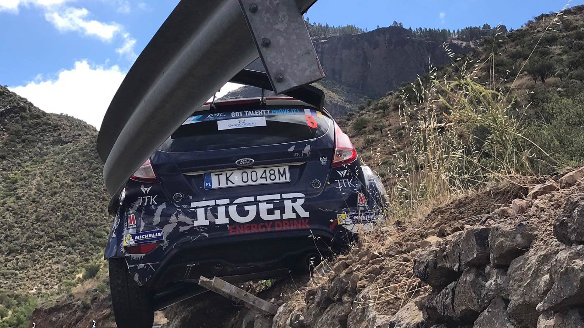Watch a Guardrail Barely Save a Ford Fiesta RS Rally Car from Certain Doom