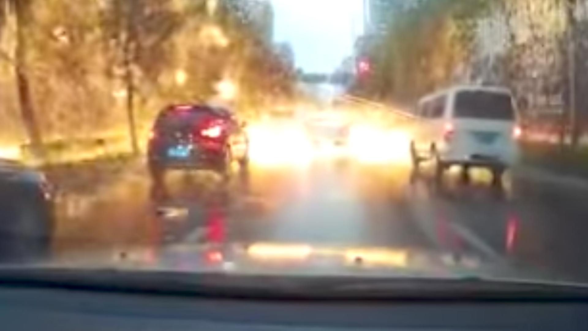Lightning Bolt Nearly Hits Traffic in China, Showers Sparks Onto Cars