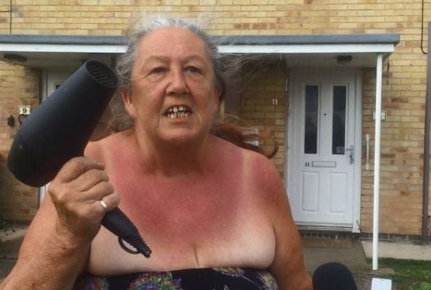 Watch an English Grandma Slow Down Traffic with a Hair Dryer