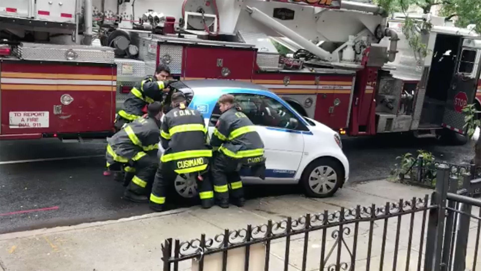 Watch FDNY Ladder 111’s Men Pick Up a Smart Car Like It Were a Toy
