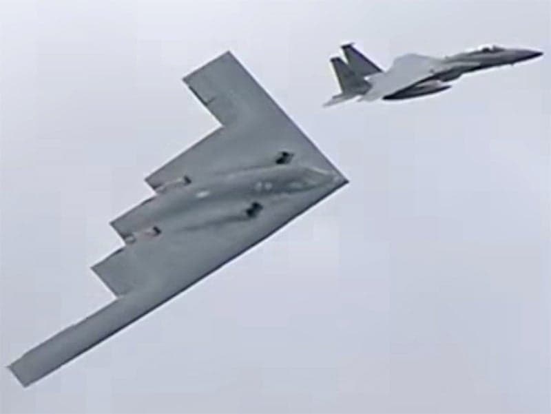 B-2 Stealth Bomber Flanked By F-15s Stuns At The Royal International Air Tattoo