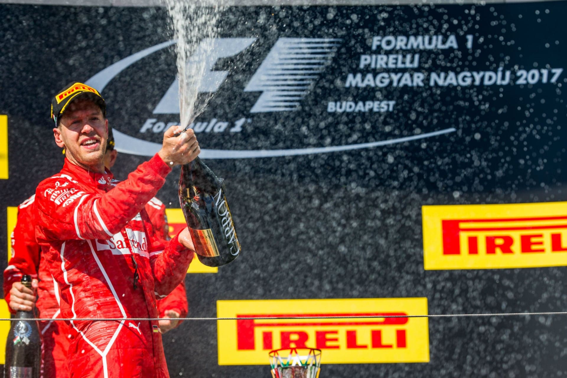 Vettel Claims Hungarian Grand Prix Victory Amidst Team Order Frenzy