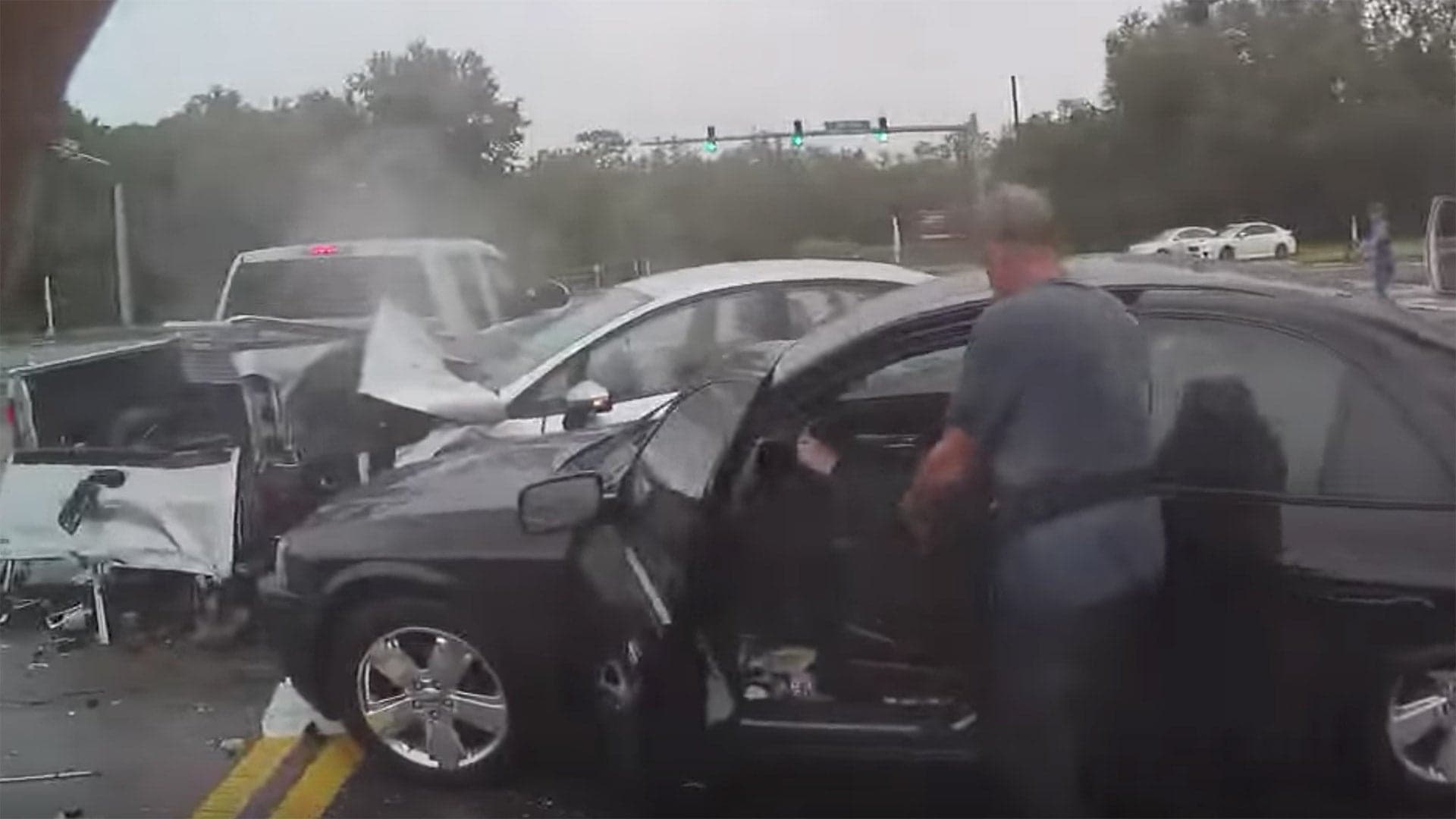 Dramatic Body Cam Footage Shows Car Careening Into Accident Scene