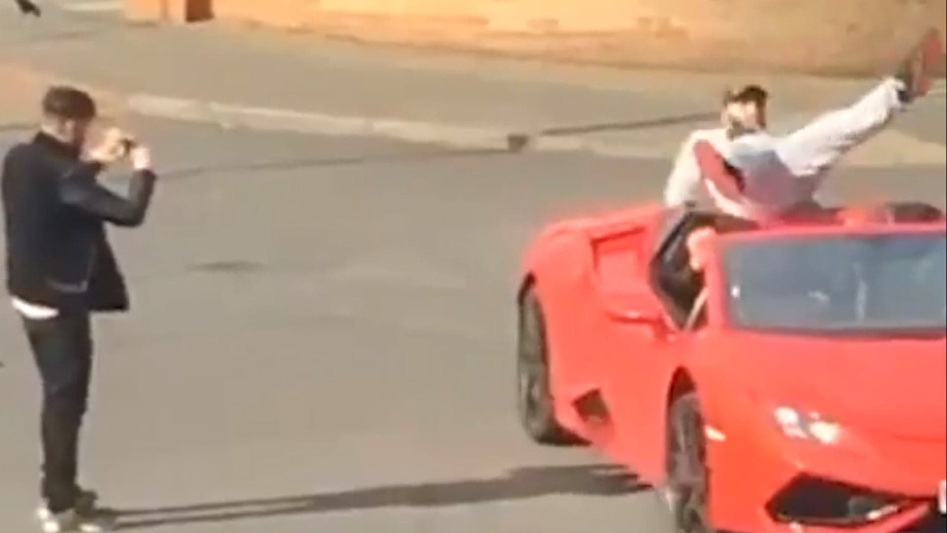 Watch This Wannabe Rapper Fall Off a Moving Lamborghini During a Music Video Shoot