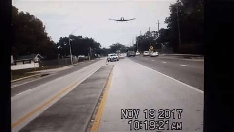 Police Dash Cam Captures Florida Man Crash-Landing Small Plane on Busy Road