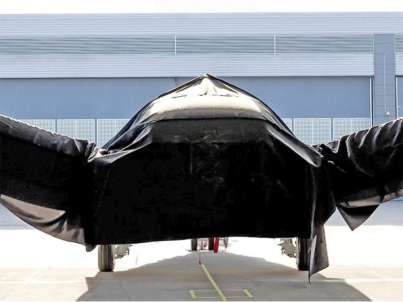 Boeing Defense Teases Mystery Aircraft Unveiling By Hiding It Under A Black Sheet