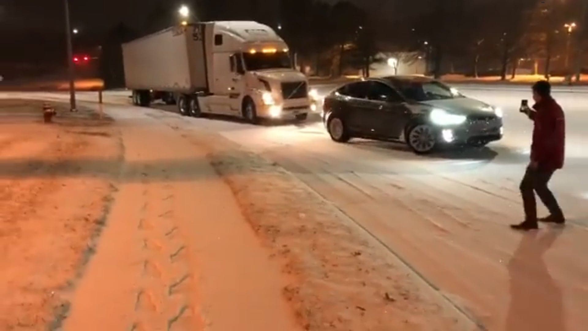Watch a Tesla Model X Pull a Tractor Trailer Stuck in the Snow