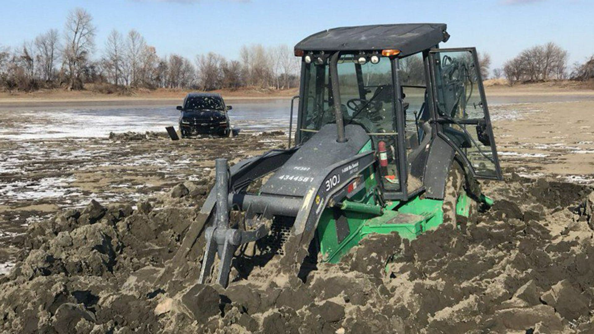 Dude-Bros Get New Chevy Silverado, Rented Backhoe Stuck in Frozen Lake While Illegally Off-Roading