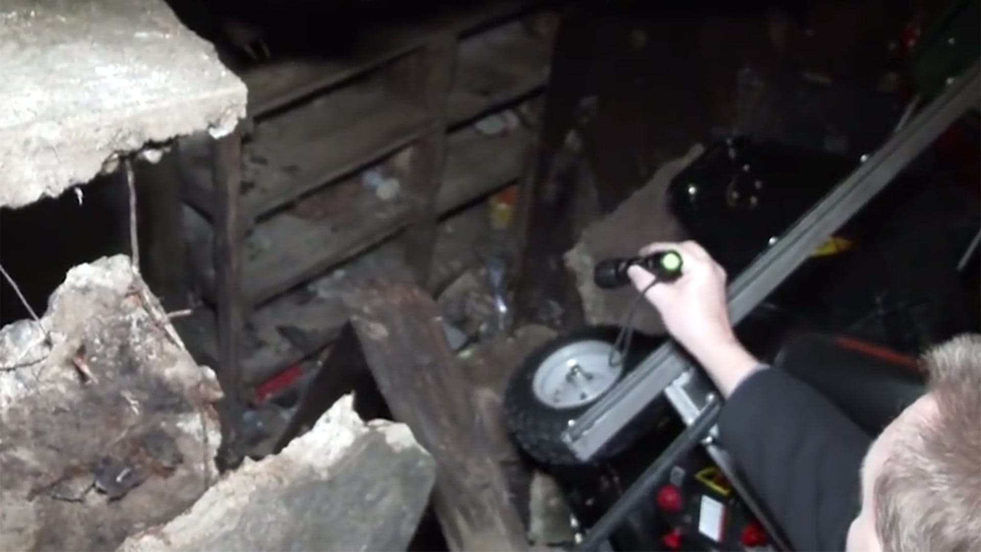 Sinkhole Reveals Creepy, Secret Old Room Underneath Suburban Family’s Garage