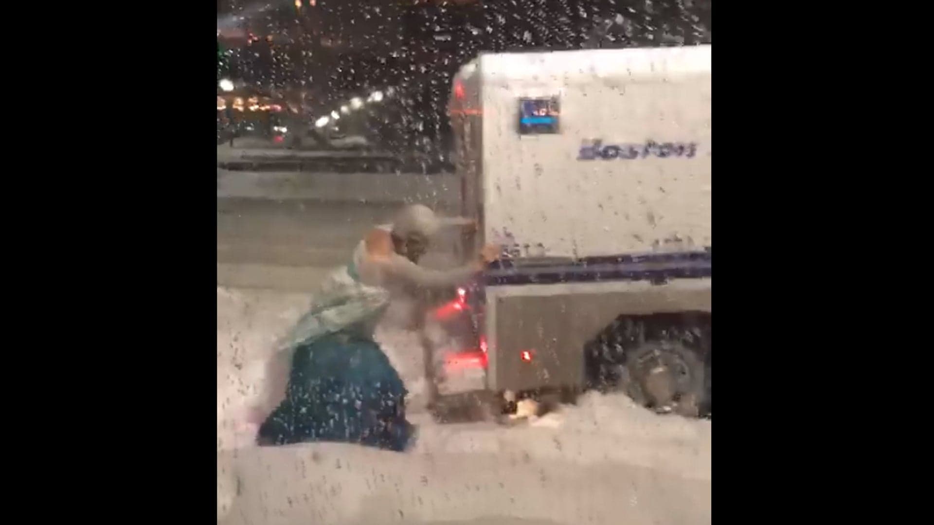 Watch Man Dressed as Elsa From Frozen Help Boston Police Van Get Un-Stuck in Nor’easter