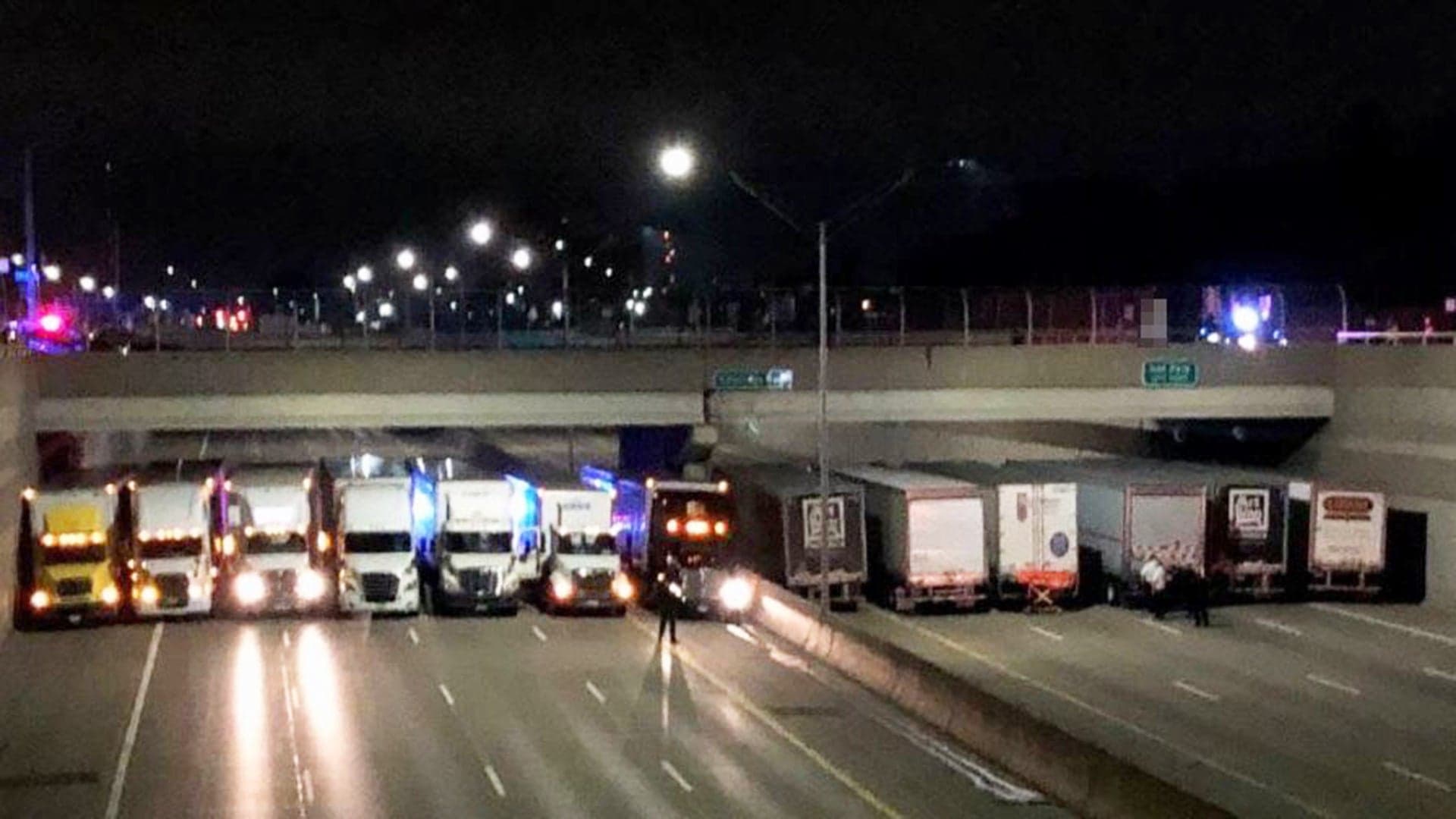 Heroic Truckers Use Their Rigs to Stop Suicidal Man From Jumping Off Bridge