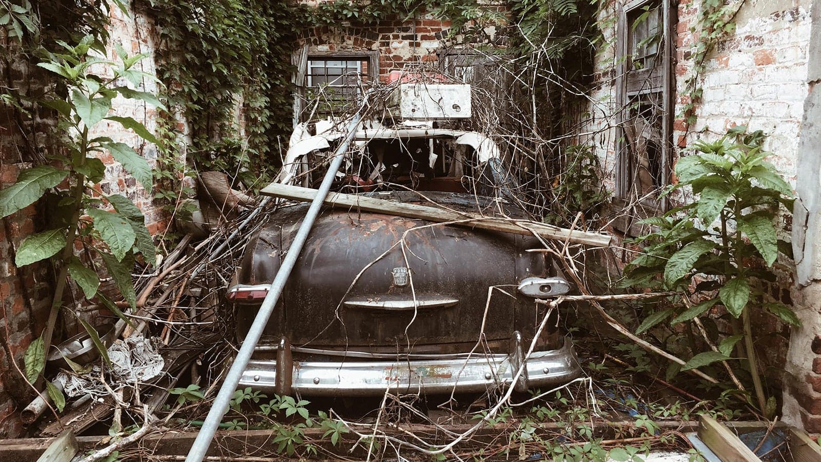 Virginia Storm Damage Reveals Abandoned 1949 Ford Convertible Hidden in an Alley Garage