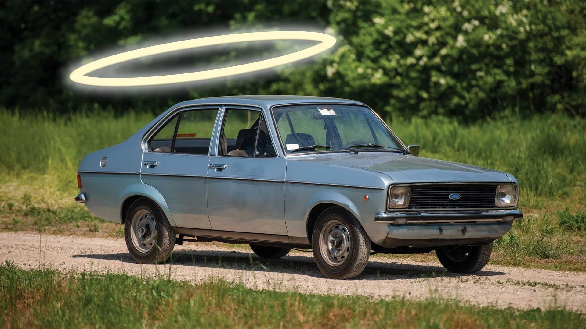 Holy Roller: Pope John Paul II’s Old Ford Escort Could Sell for $300K at Auction
