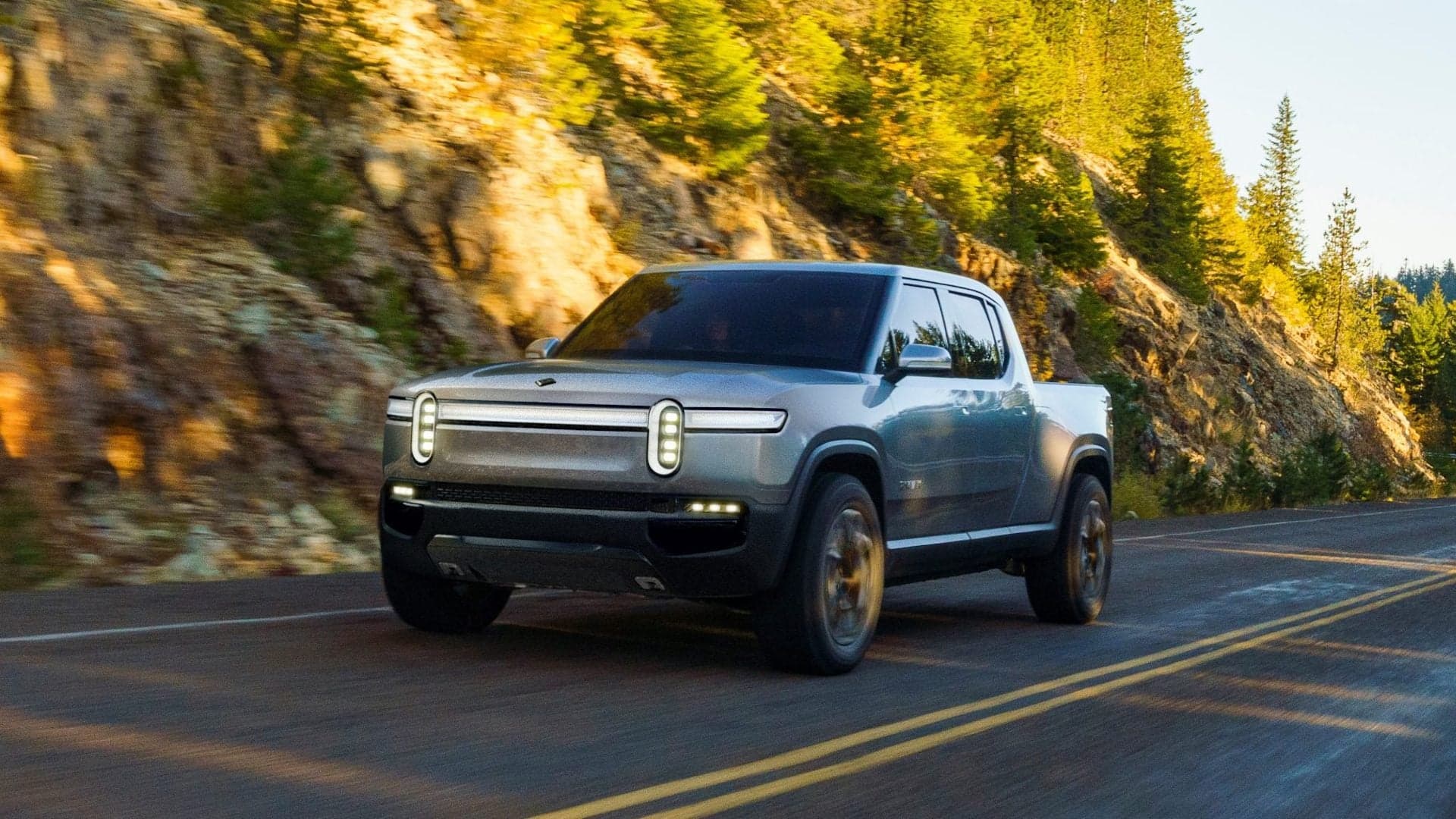 Rivian Is Secretly Camouflaging Its R1T Pickup Truck as Ford F-150s for Testing