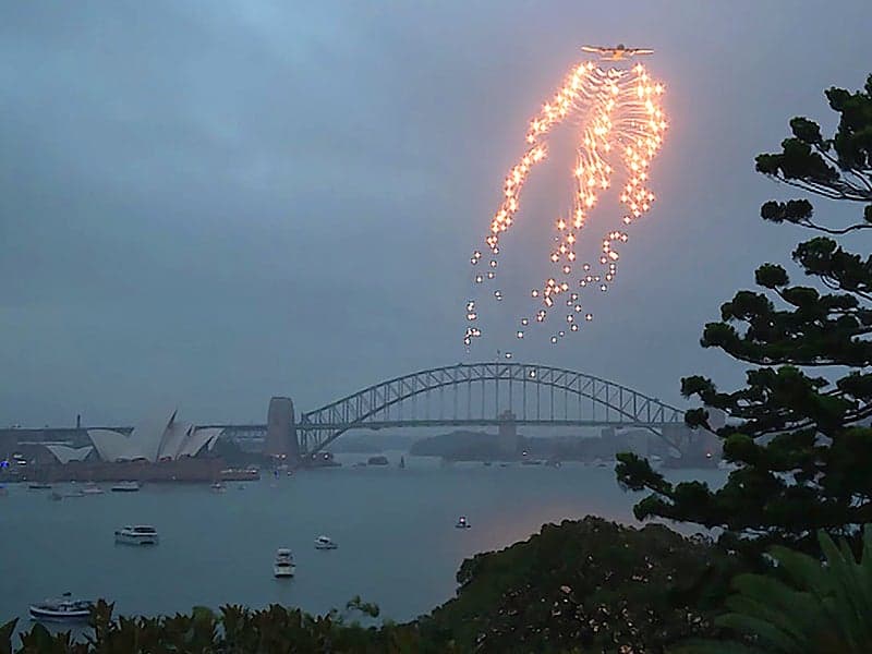 Watch This C-130J Make An Incredible Flare-Popping Musical Flyover Of Sydney For Australia Day (Updated)