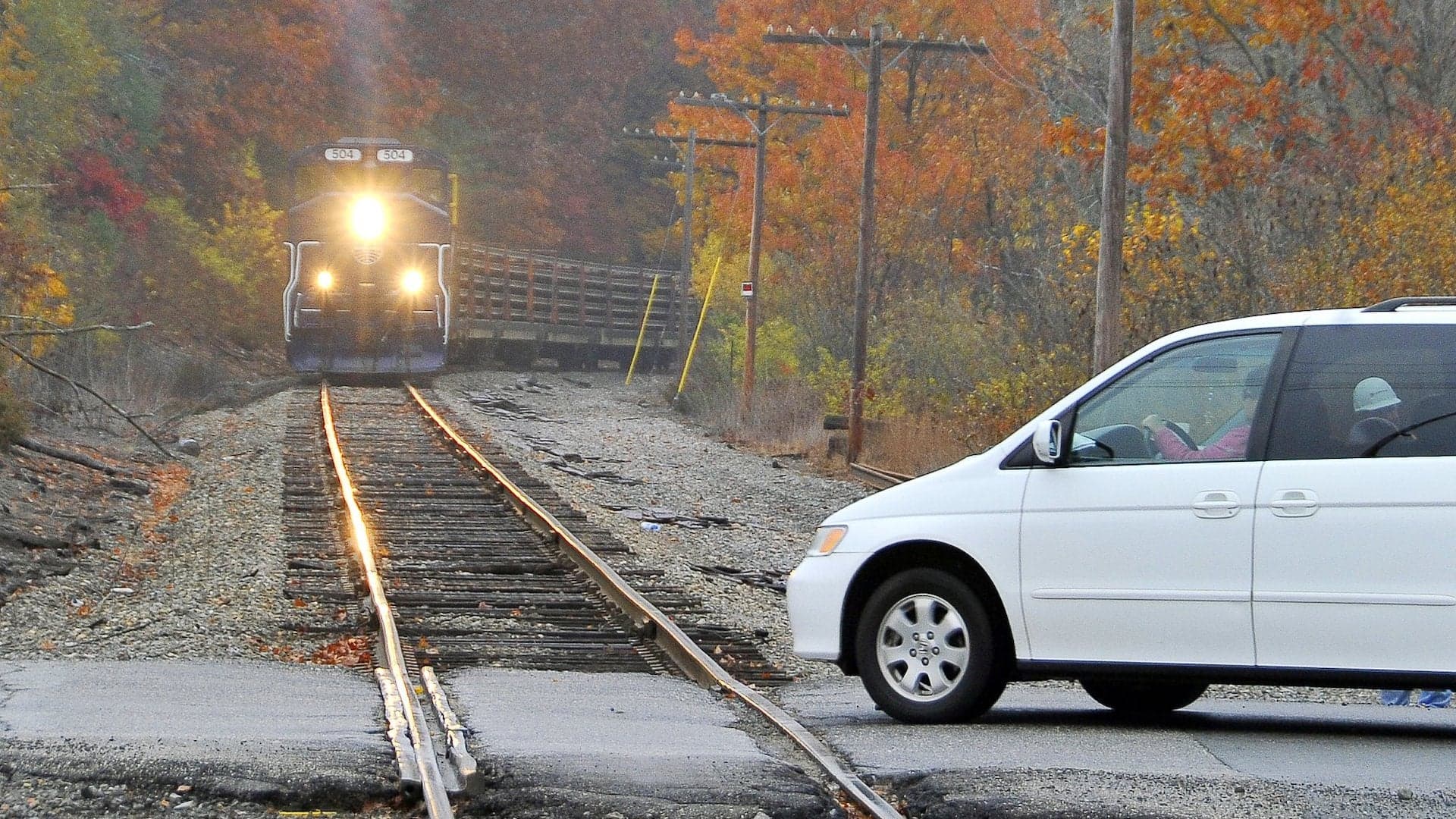 Cop, Brave Citizens Pull 96-Year-Old Woman From Car Seconds Before Train Hits