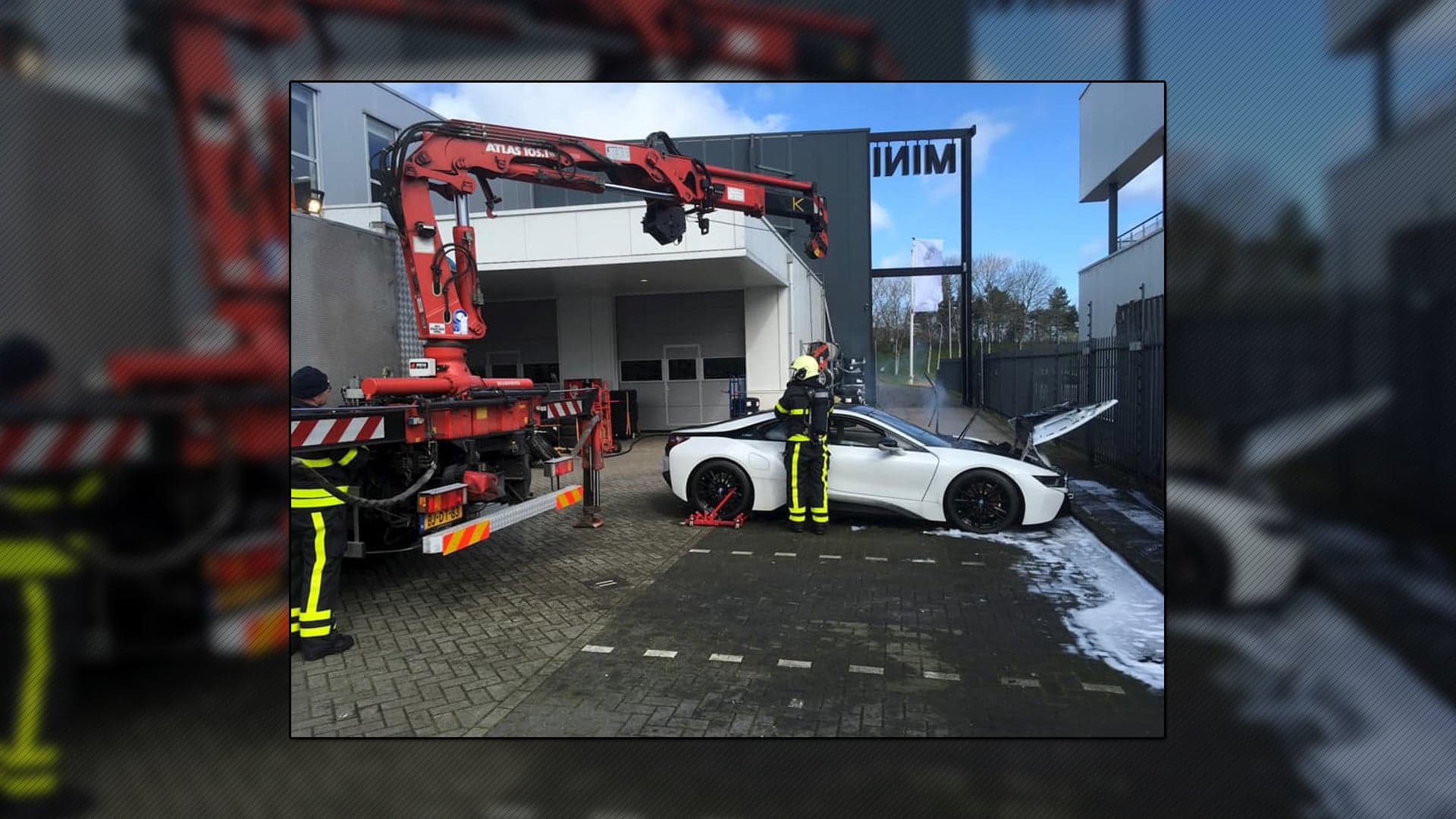 See an Emergency Crew’s Shocking Way of Extinguishing a Fiery BMW i8