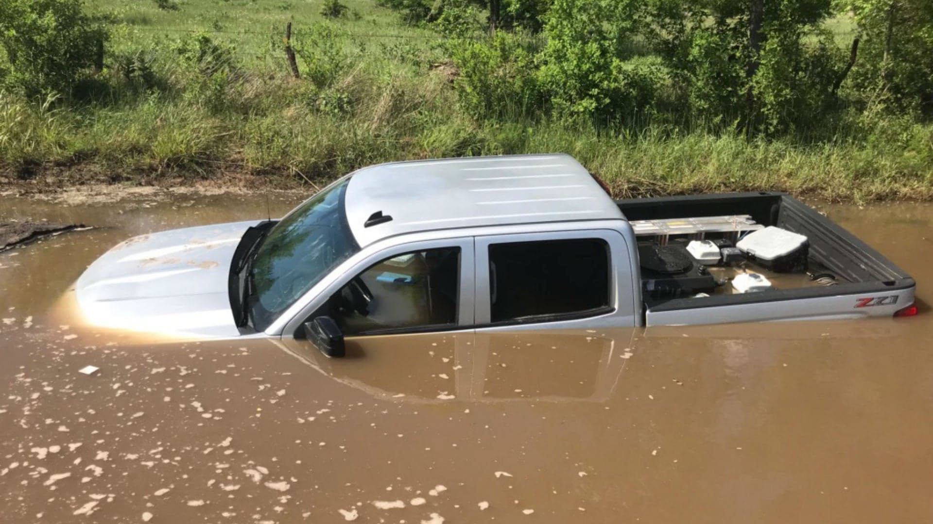 Defiant Chevrolet Silverado Pickup Truck Driver Learns ‘Turn Around Don’t Drown’ Lesson the Hard Way