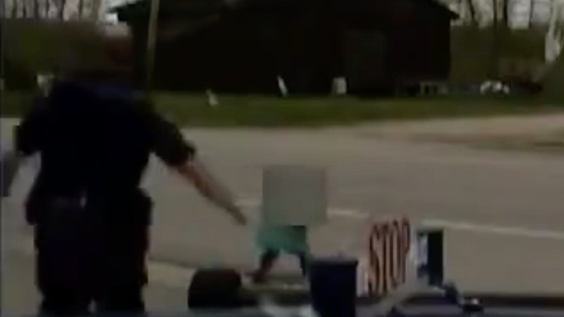 Watch a Michigan Police Sergeant Save a Toddler from Being Hit by a Dump Truck