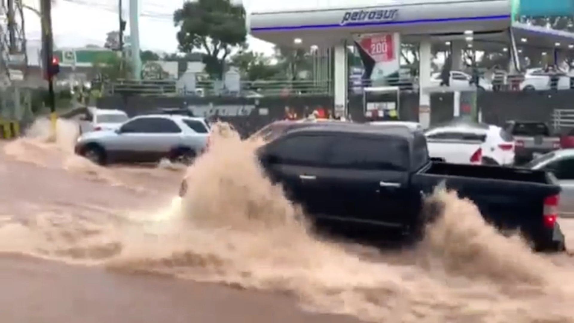 Watch a Ballsy Toyota Tundra Owner Drive Through a Raging Flash Flood Like It’s Nothing