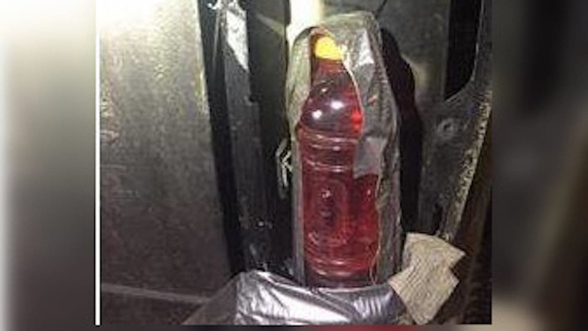 Crafty Truck Driver Escapes Ticket After Using Red Drink Bottle to Fix Broken Taillight