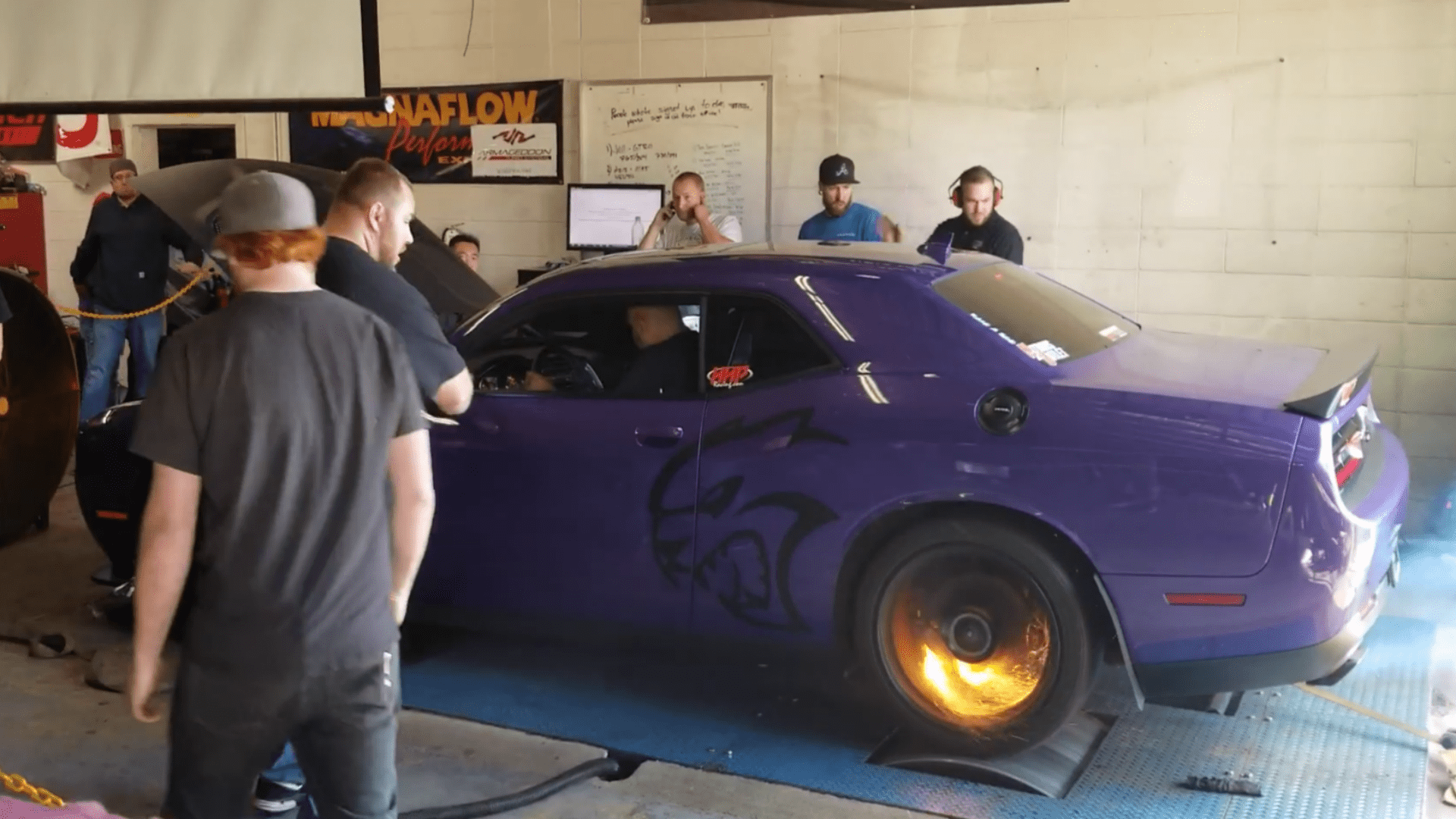 Watch a Dodge Challenger Hellcat Break a Dyno Strap Loose and Smoke Its Rear Wheels