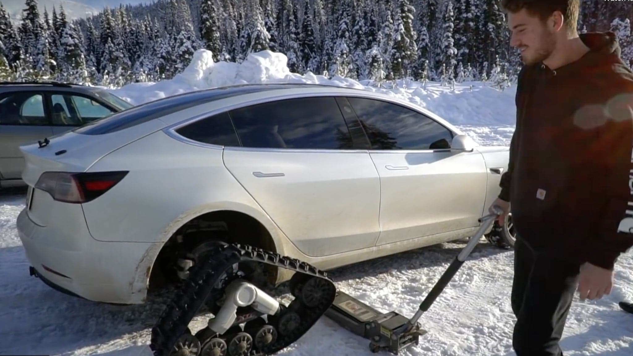 Tank Tracks Turn the Tesla Model 3 Into a Surprisingly Capable Off-Roader