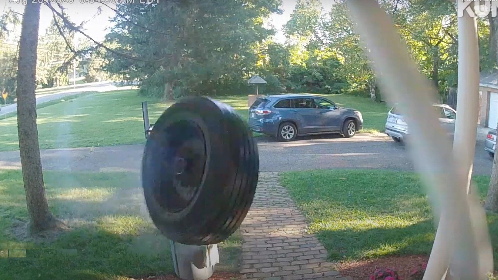 Here’s What Happens When a Runaway Tire Meets a House at 65 MPH