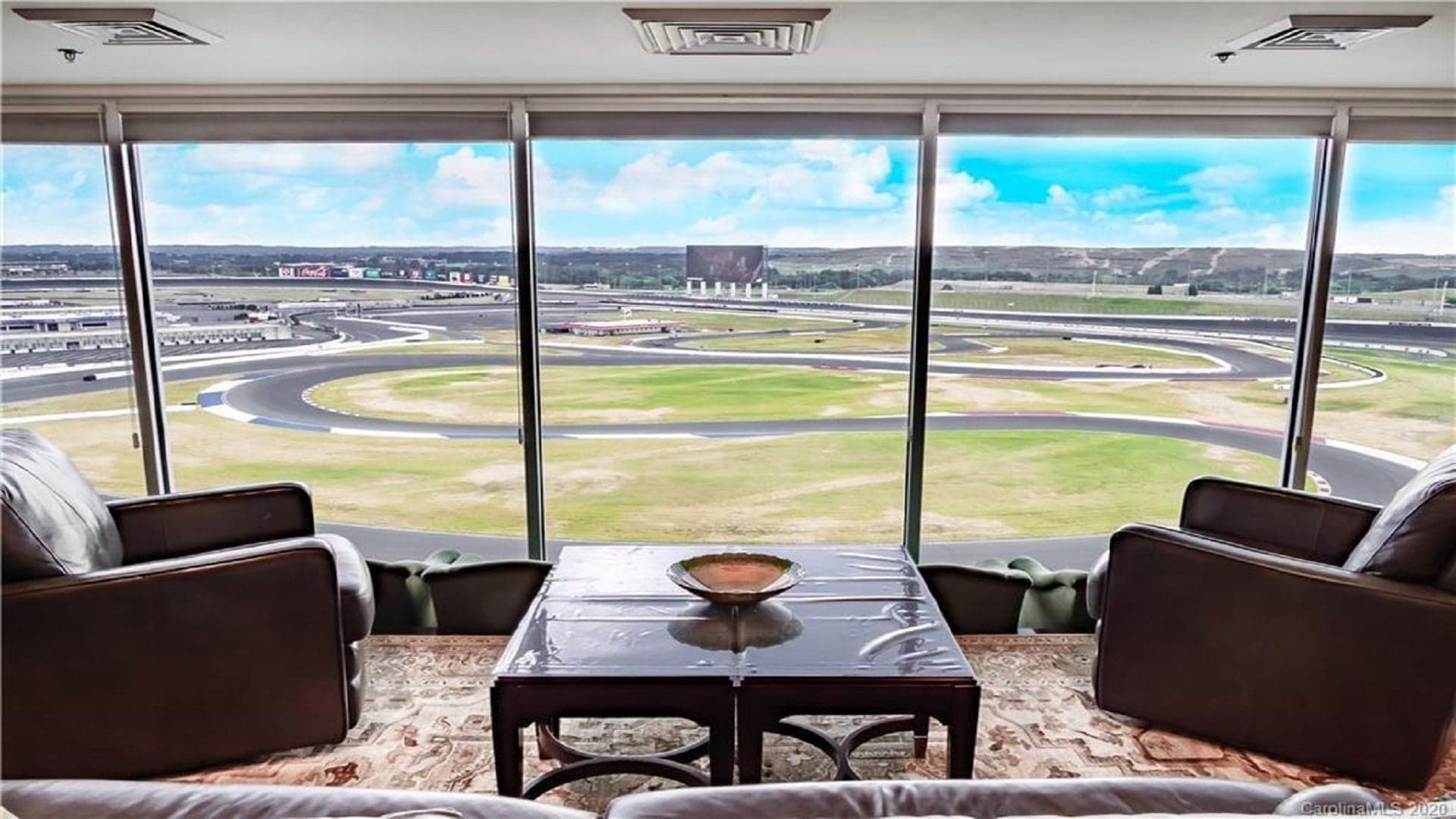 Buy This Two-Bed Condo Above Charlotte Motor Speedway and Never Leave the Track Again