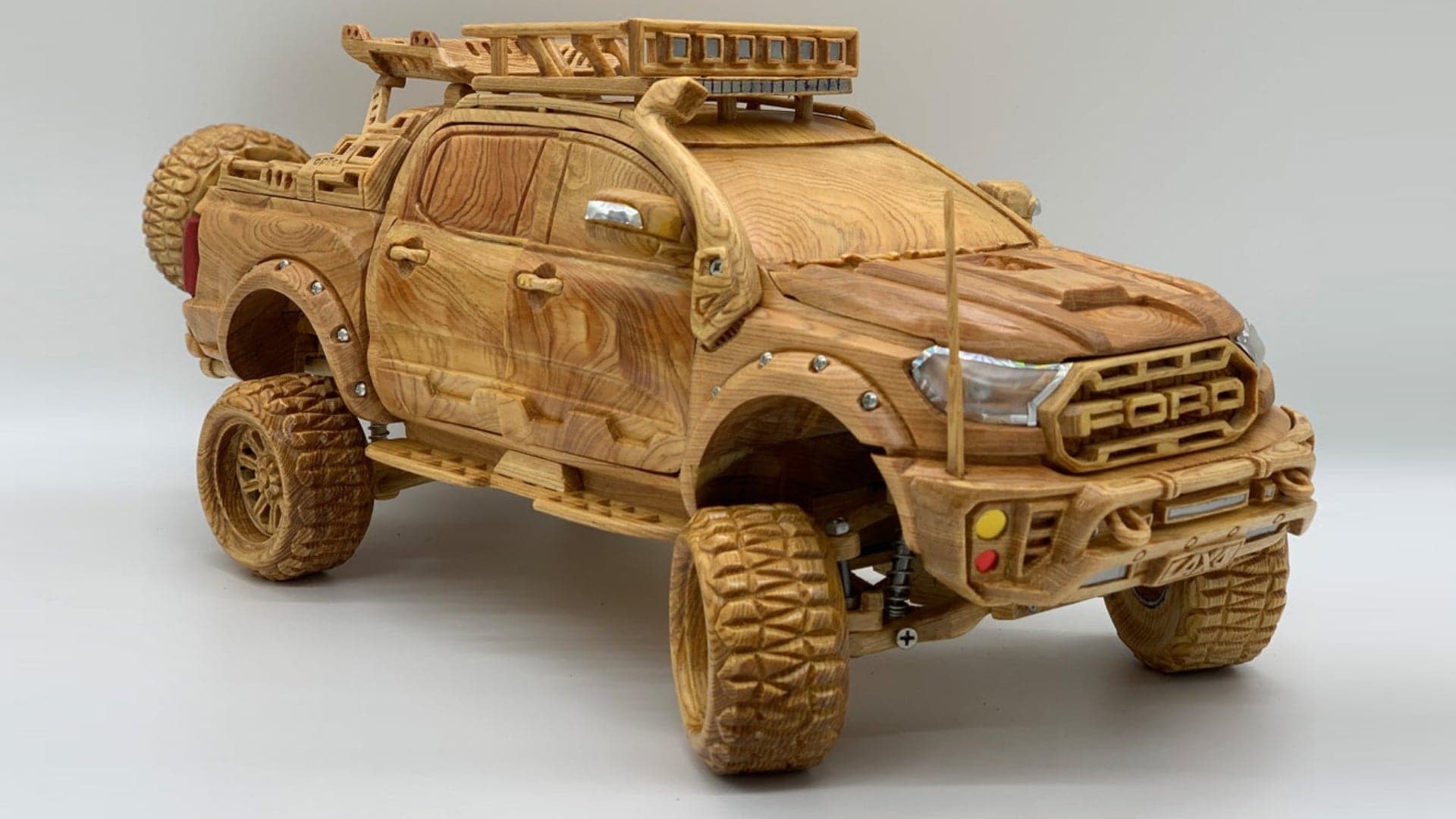 Watch This Master Artisan Carve a Ford Ranger Raptor Pickup From a Block of Wood