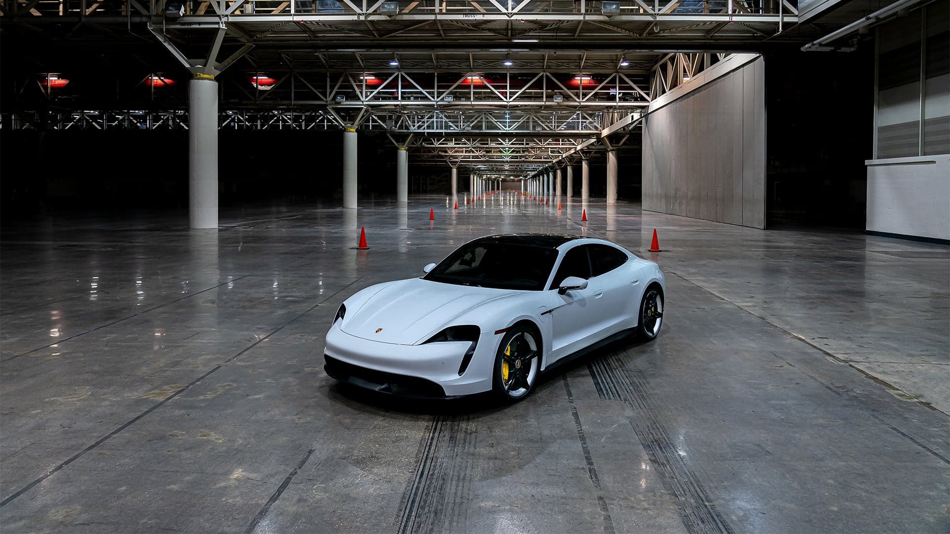 Porsche Taycan Turbo S Breaks Indoor Speed Record With 102-MPH Run Inside a Convention Center