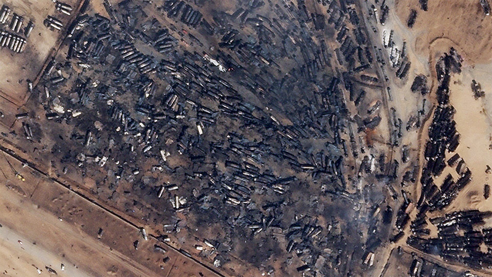 Satellite Images Show Horrible Aftermath Of Explosion That Burned Hundreds Of Trucks In Afghanistan