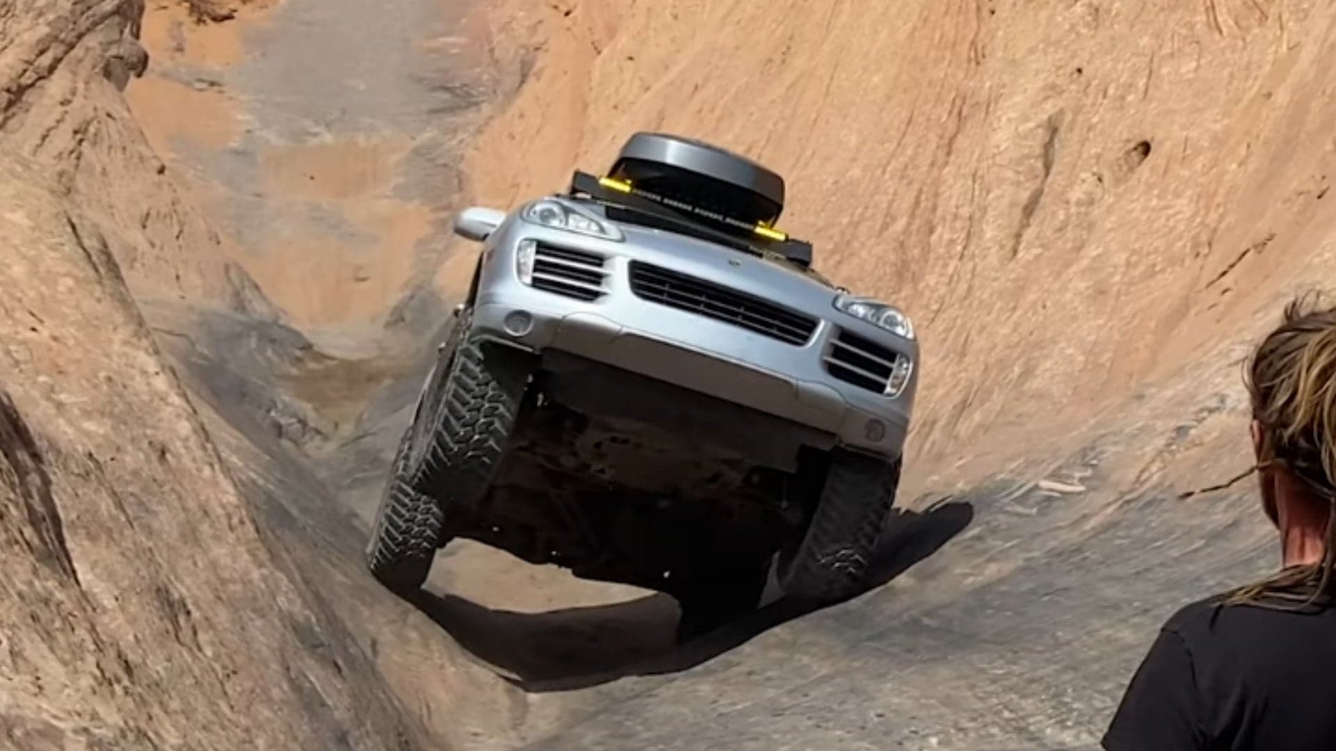 Watch a Lifted Porsche Cayenne Go Three-Wheeling Up Hell’s Gate in Moab