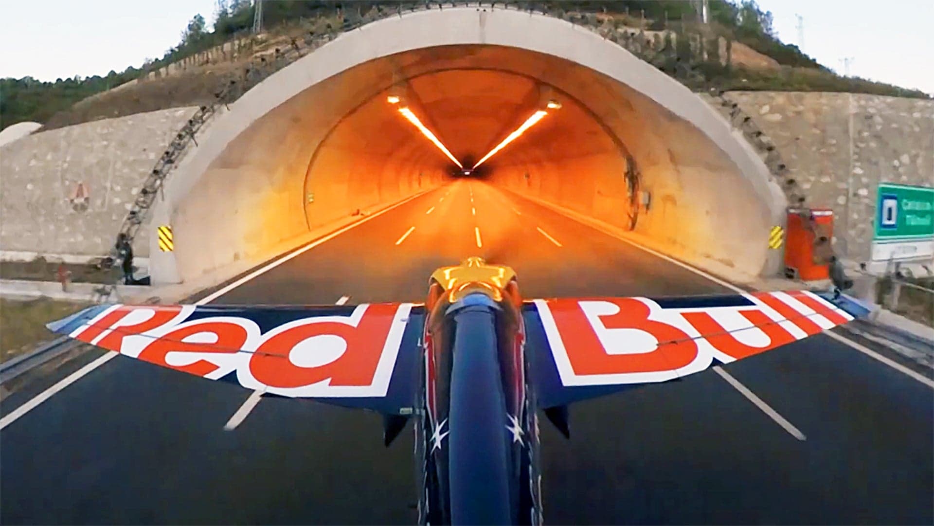 This Video Of A Red Bull Stunt Pilot Flying Through Two Tunnels Is Absolutely Bonkers