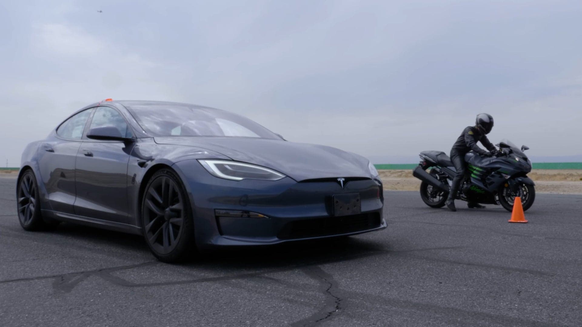 Watch a Tesla Model S Plaid Smoke a Hayabusa in a Drag Race
