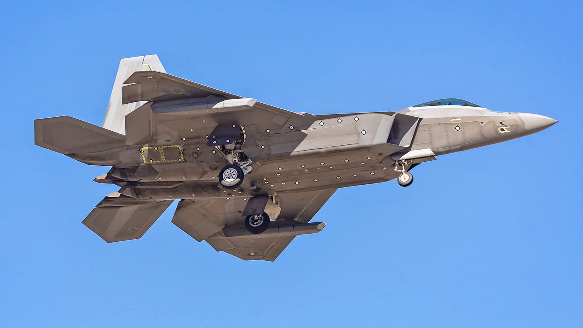 F-22 Raptor Spotted Flying With Stealthy Underwing Pods