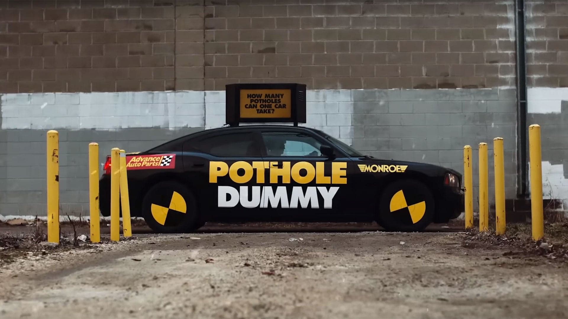 Watch This Dodge Charger Try to Hit Every Pothole in Chicago