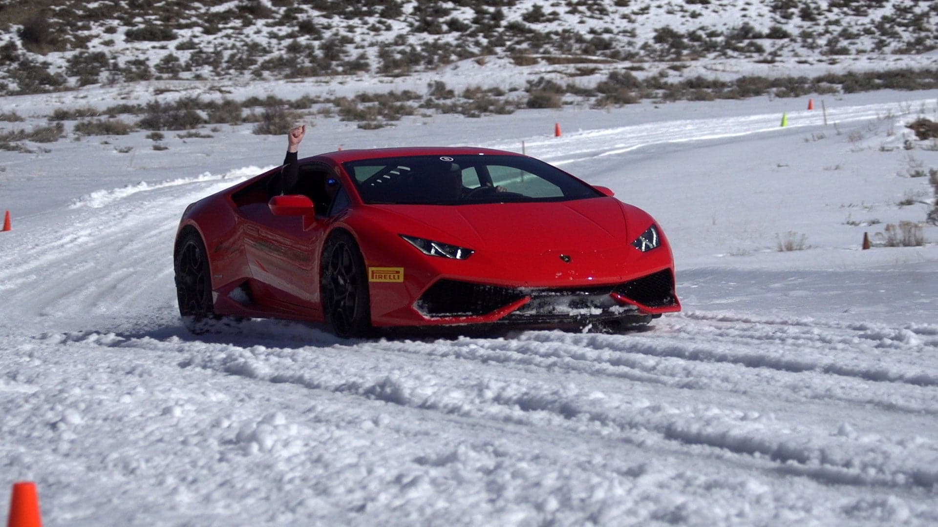 Watch These Lamborghinis Drift at Snow Driving School