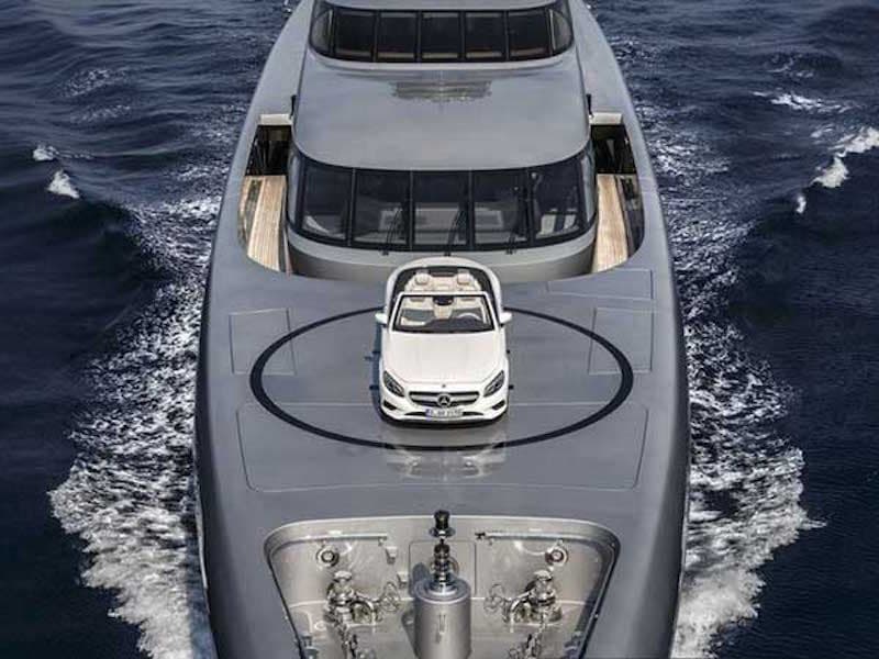 Watch This 253-foot Yacht Carry a Benz Out to Sea