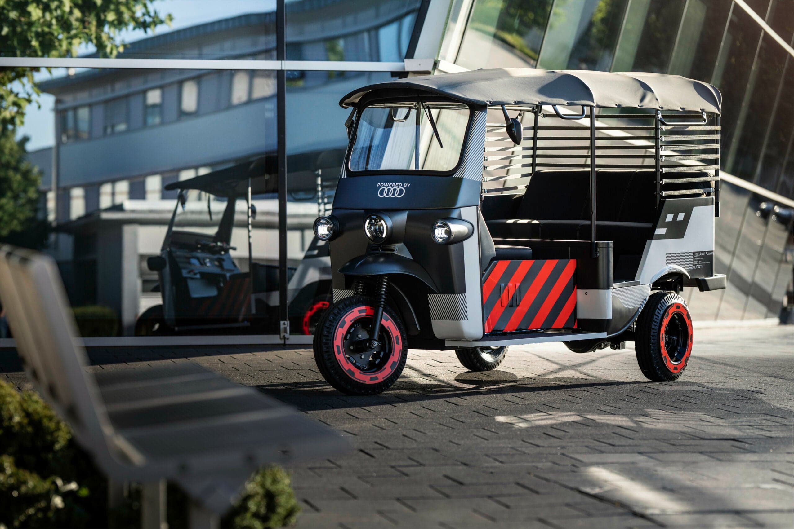 The E-Tron rickshaw in its Audi livery