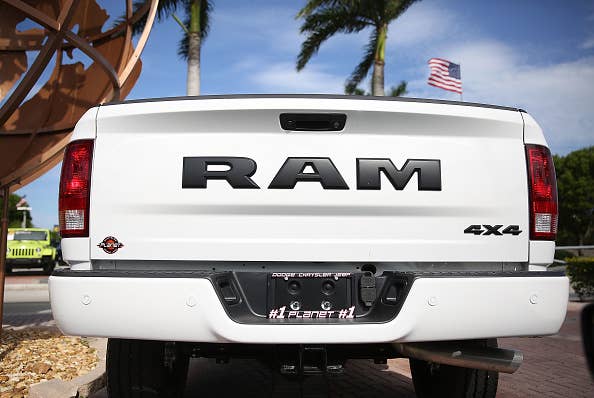 The back of a white Ram truck on a sales lot in Miami, Florida