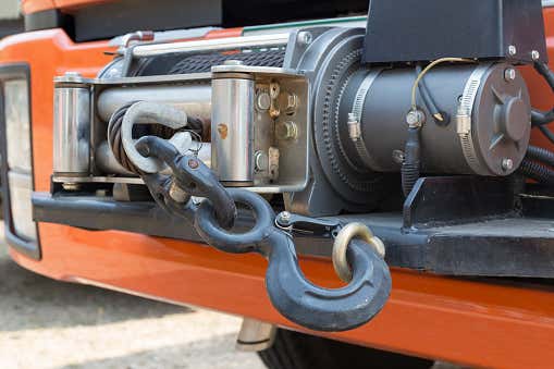 A winch attached to the front of a vehicle