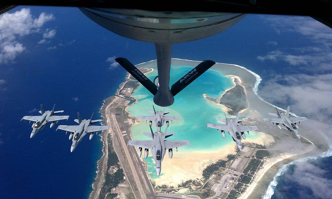message-editor%2F1593729476364-1280px-fa-18_hornets_being_refueled_over_wake_island_2011.jpg