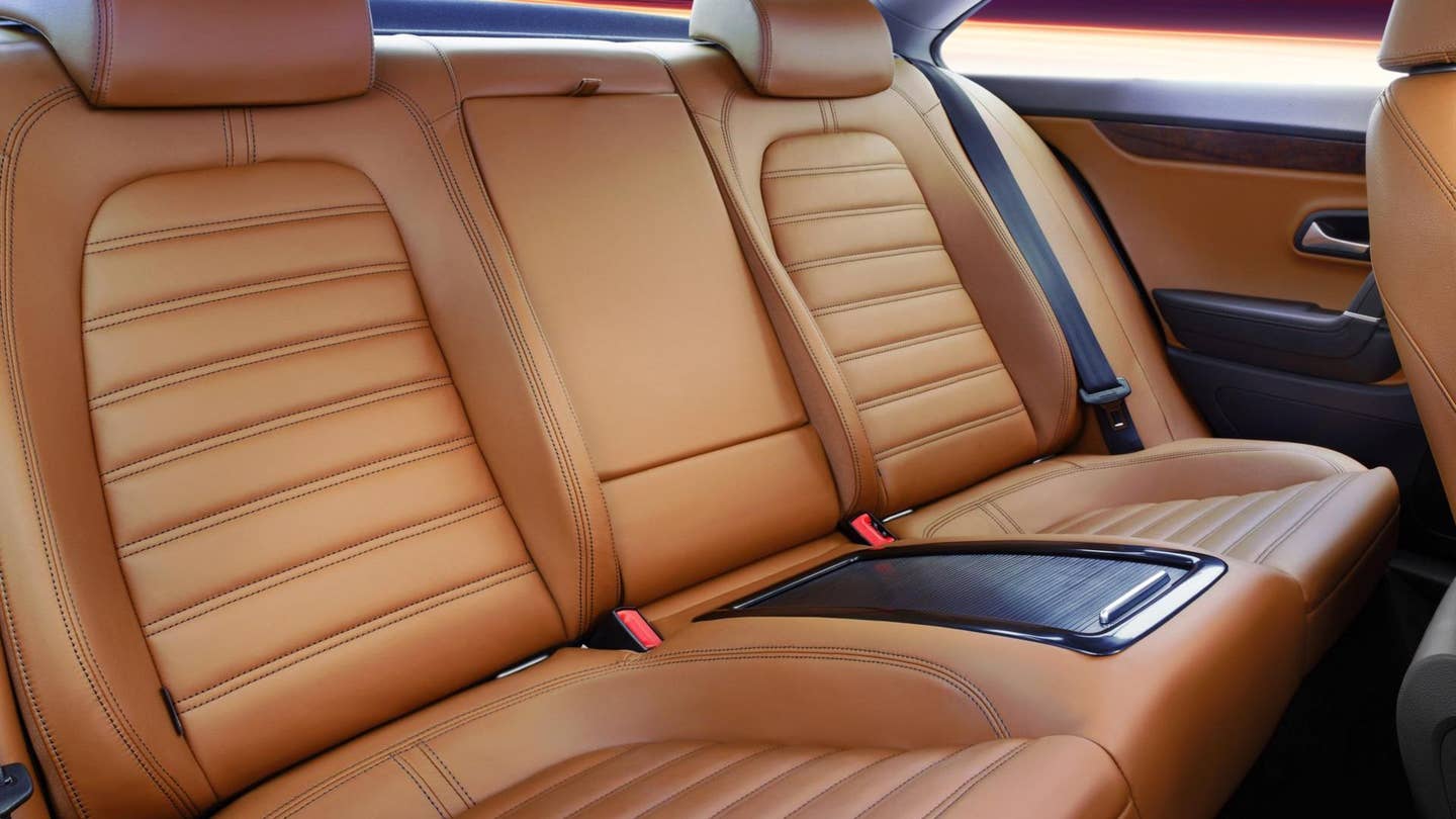 Rear leather seats of an SUV.
